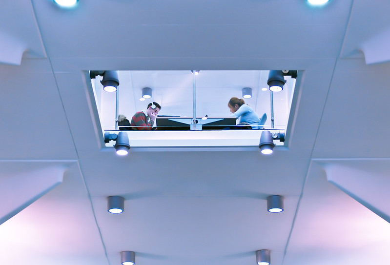 A male and a female student studying at a table